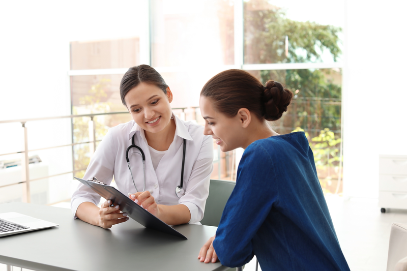 pharmacist speaking with patient